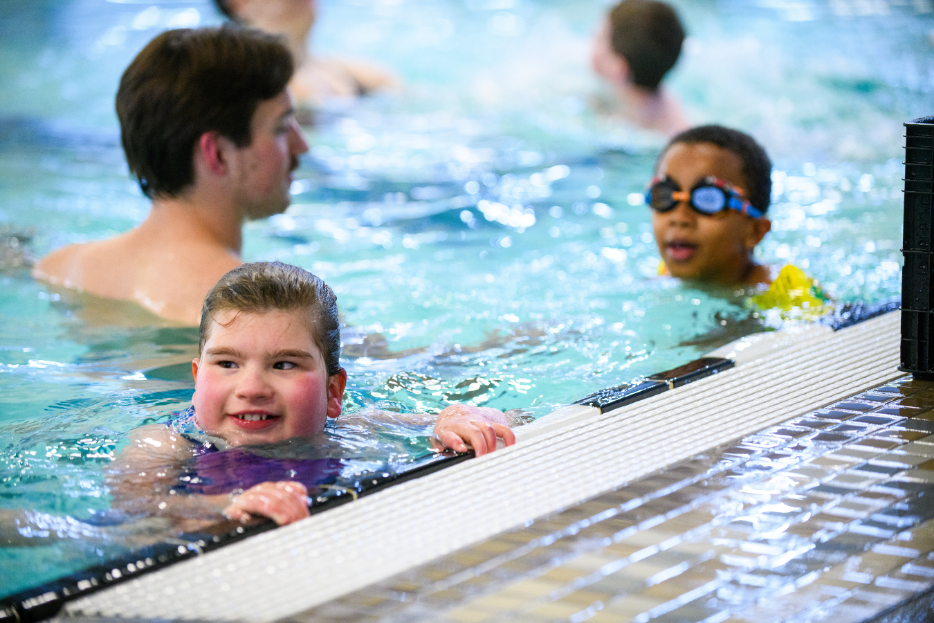 people with varying abilities swimming
